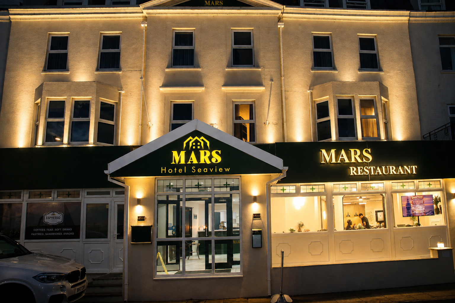 Mars Hotel Seaview illuminated at night